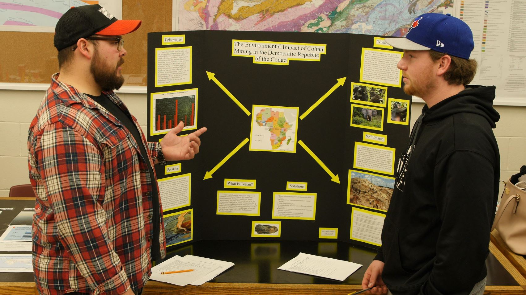 Photo of students at a booth during the tradeshow
