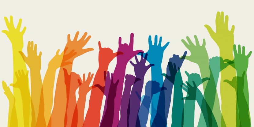 Group of raised arms with rainbow colour